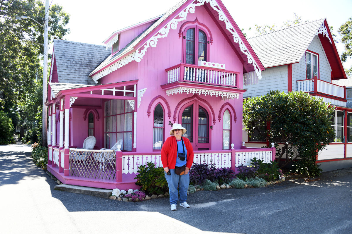 199 Delaine Gocke in front of Gingerbread House on Martha's Vineyard.jpg